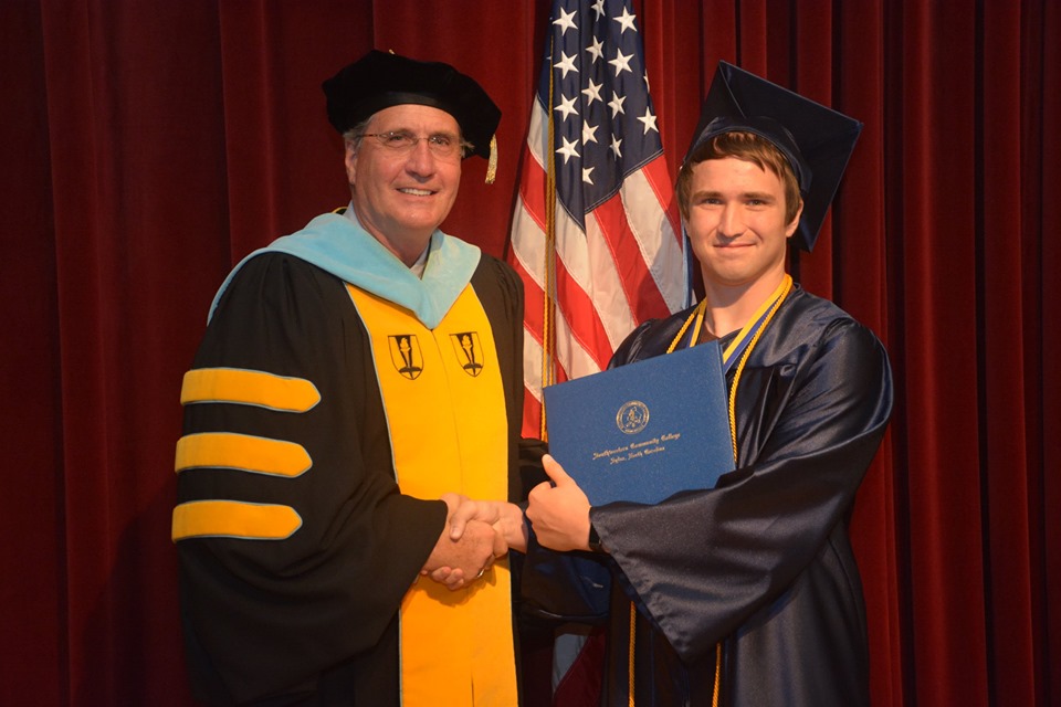 Dr. Tomas and Graduate