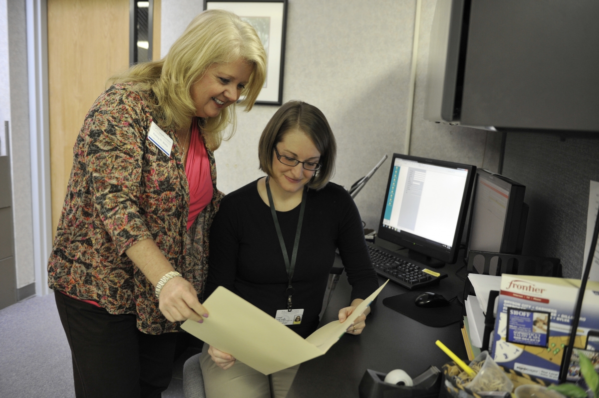 Photo of Penny Wells with student