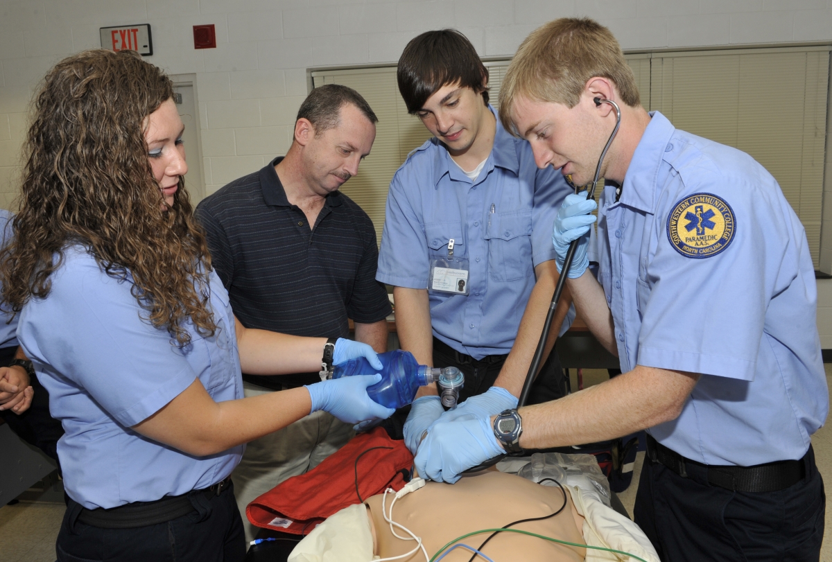 Photo of Eric Hester with students