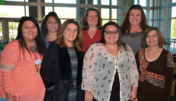 SCC medical assisting graduates pose for picture at pinning ceremony on Dec. 13.