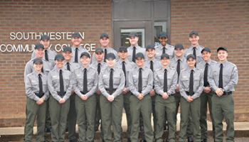 NPS-SLET graduates pose for picture before graduation ceremony.