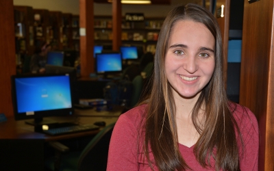 Veronica Judson is shown inside the college's library.