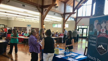 People interacting at job fair