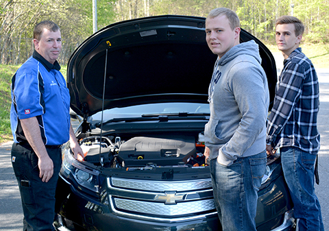 Photo of David Myers (left) and students Tyler James (center) and Logan Mathis