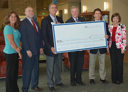 Photo of SCC receiving TRIO grant check