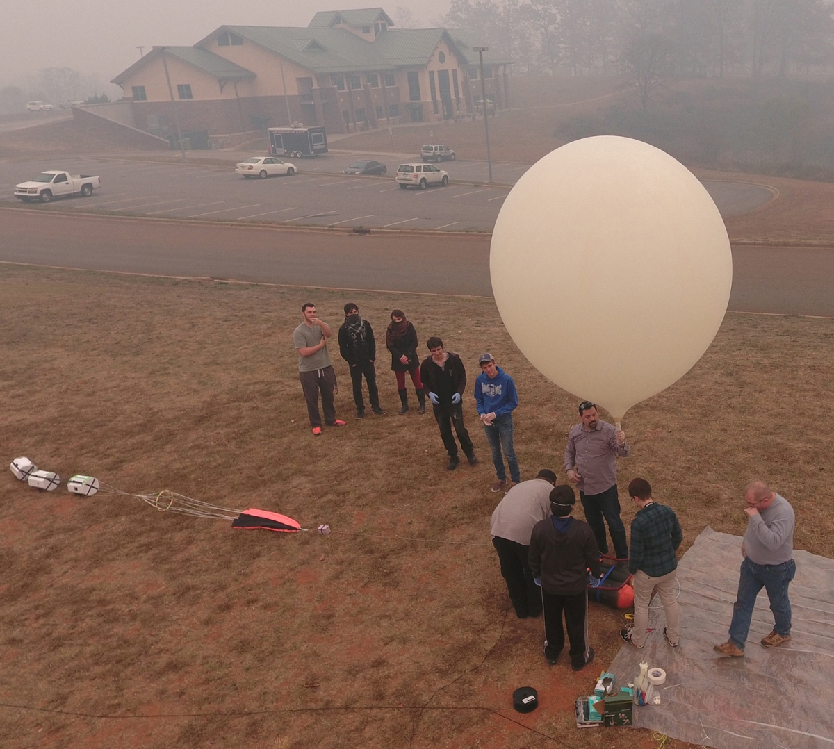 SCC students test out weather balloon they built at SCC's Macon Campus