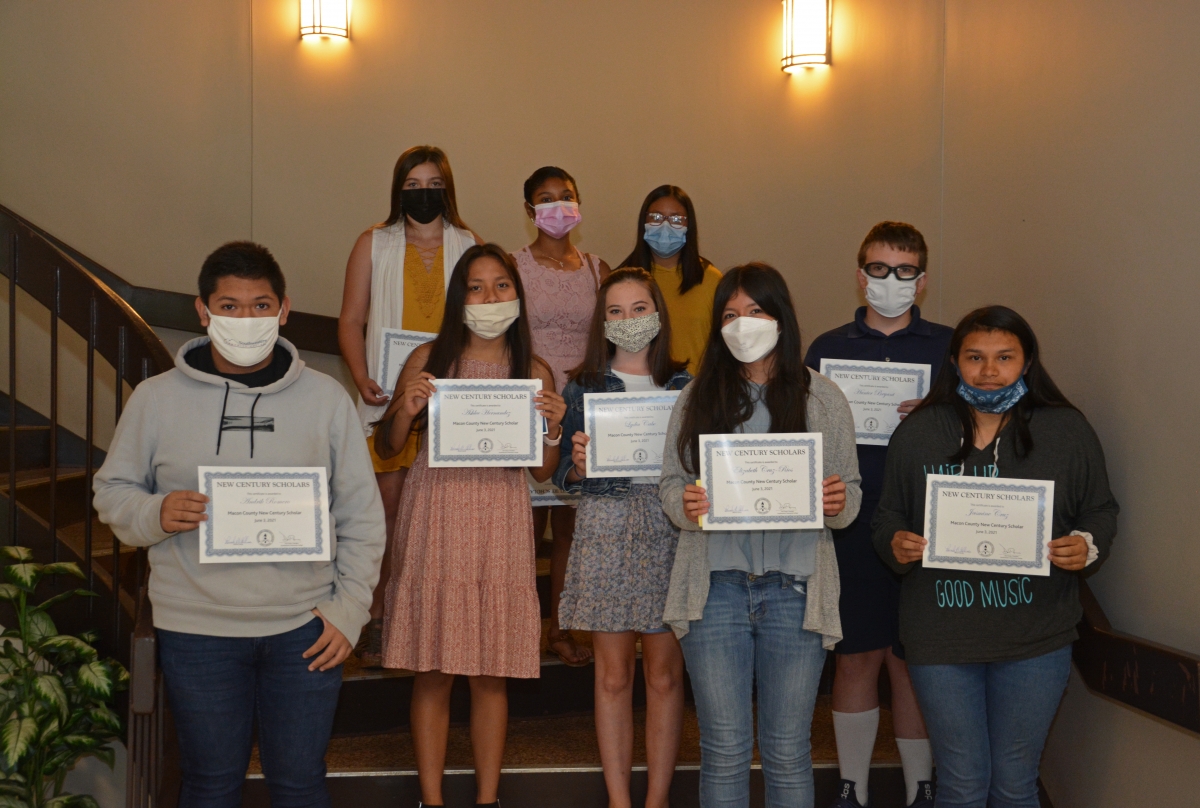 Macon County students inducted into the New Century Scholars program on June 3 included, bottom row from left: Andrick Romero, Ashlee Hernandez, Lydia Cabe, Elizabeth Cruz-Rios, Hunter Bryant, and Jasmine Cruz. Top row from left: Delaney McLean, Jessica Hernandez, and Kayla Lopez-Cruz. Not pictured: Melaina Worrell.