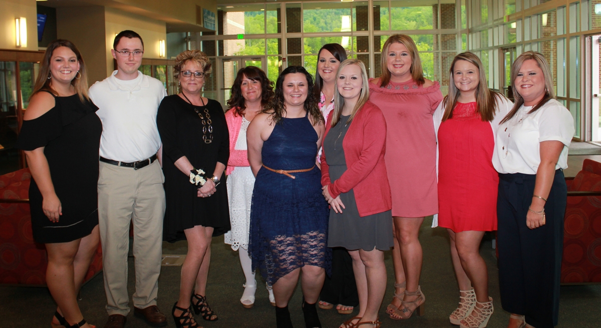 SCC respiratory therapy students post for group picture before their pinning ceremony