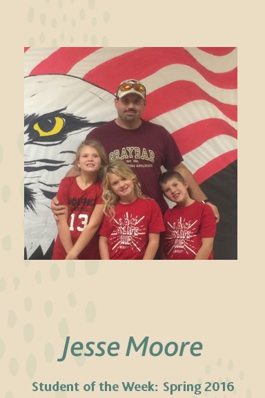 A picture of Jesse Moore with his three children.