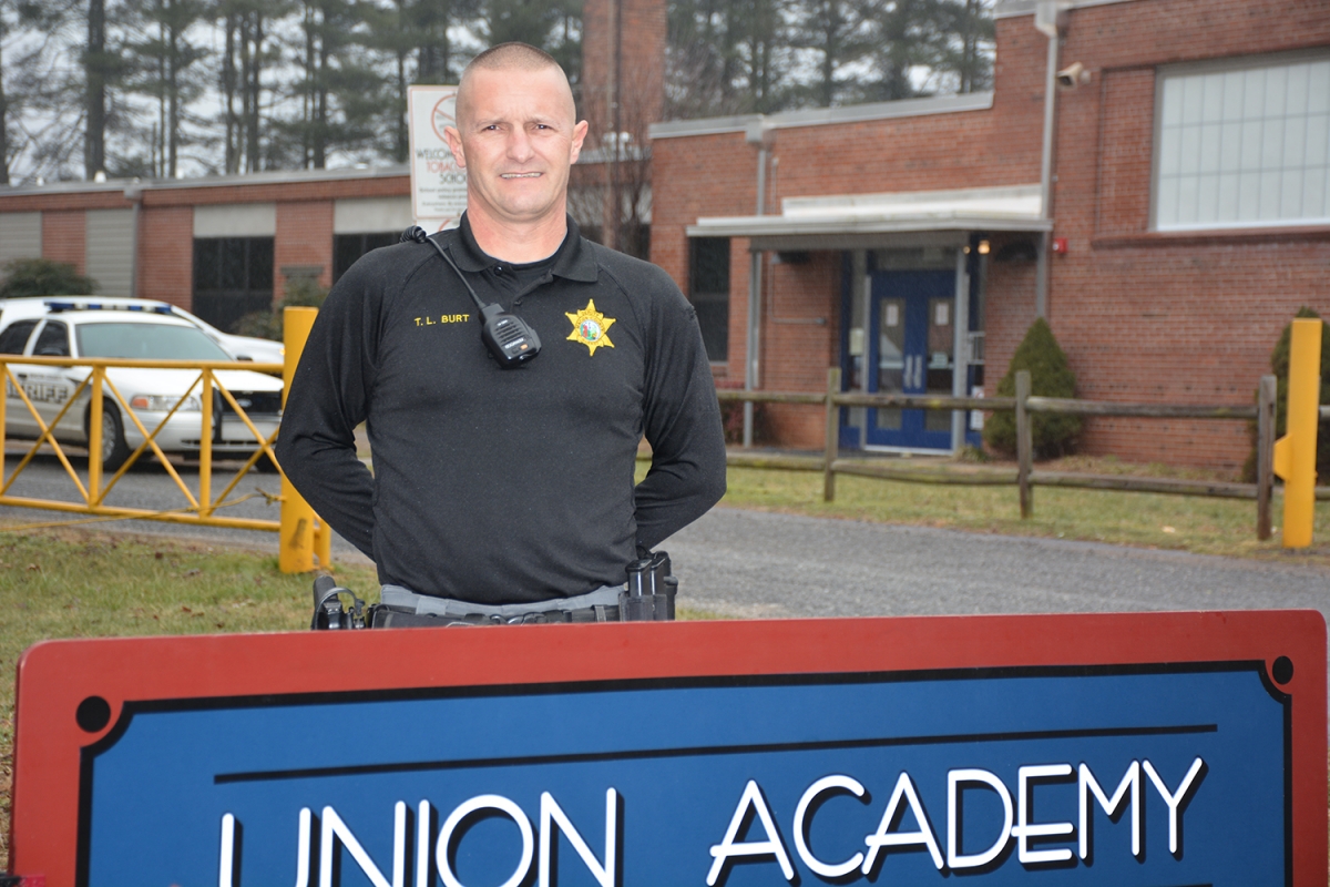 Photo of Troy Burt wearing his sheriff's office uniform.