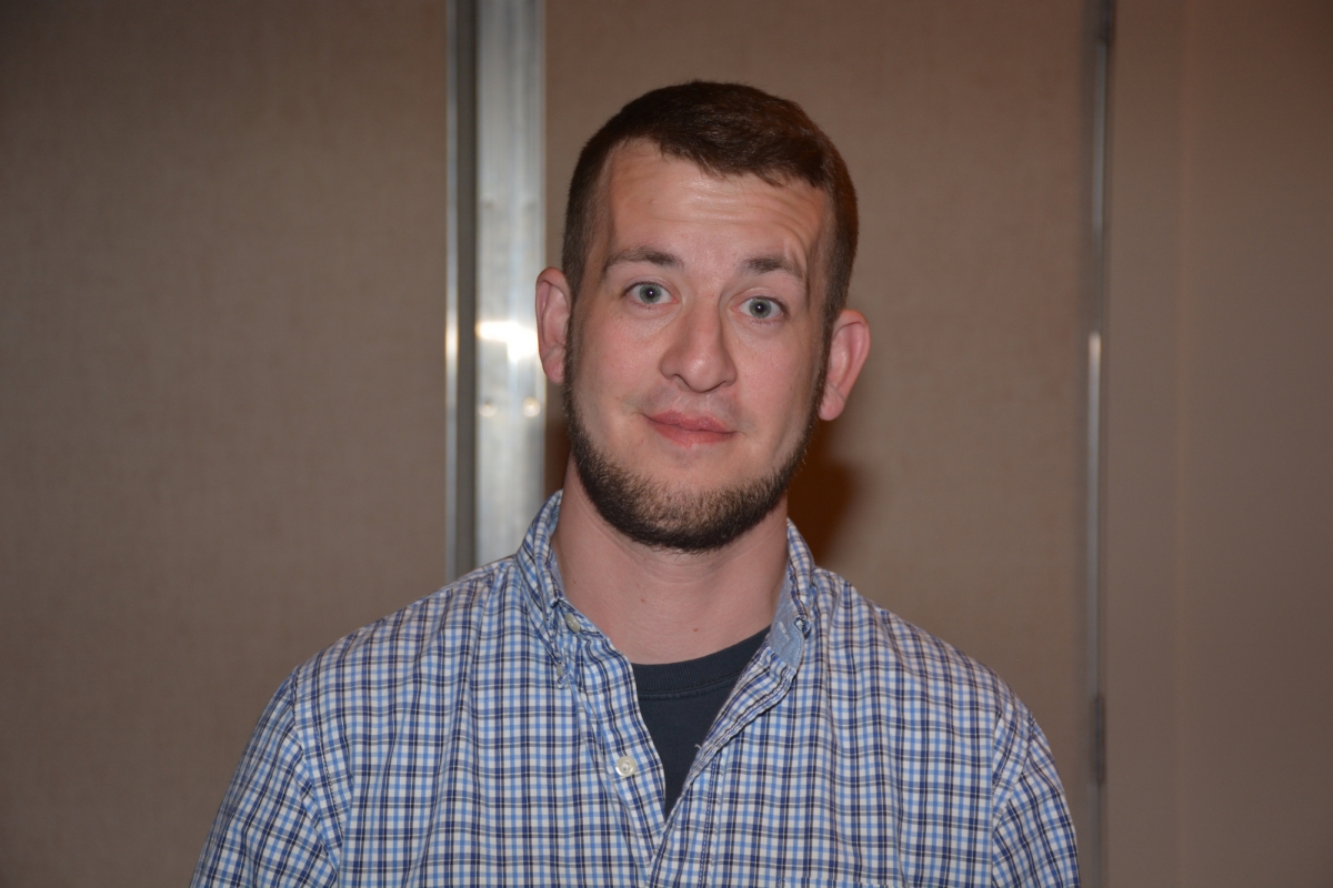 Man smiles at camera