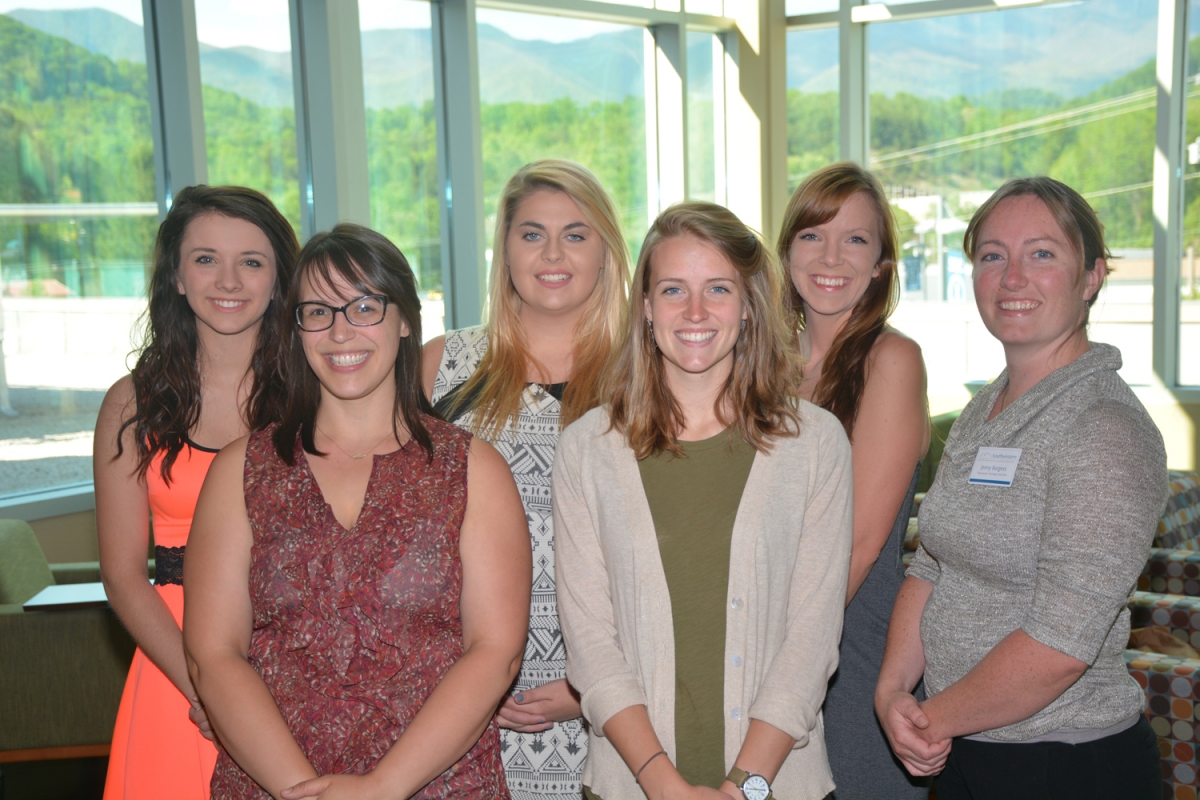 Therapeutic massage students smiling 