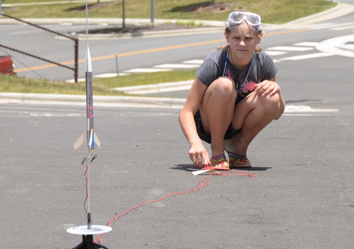 Child watching rocket launch