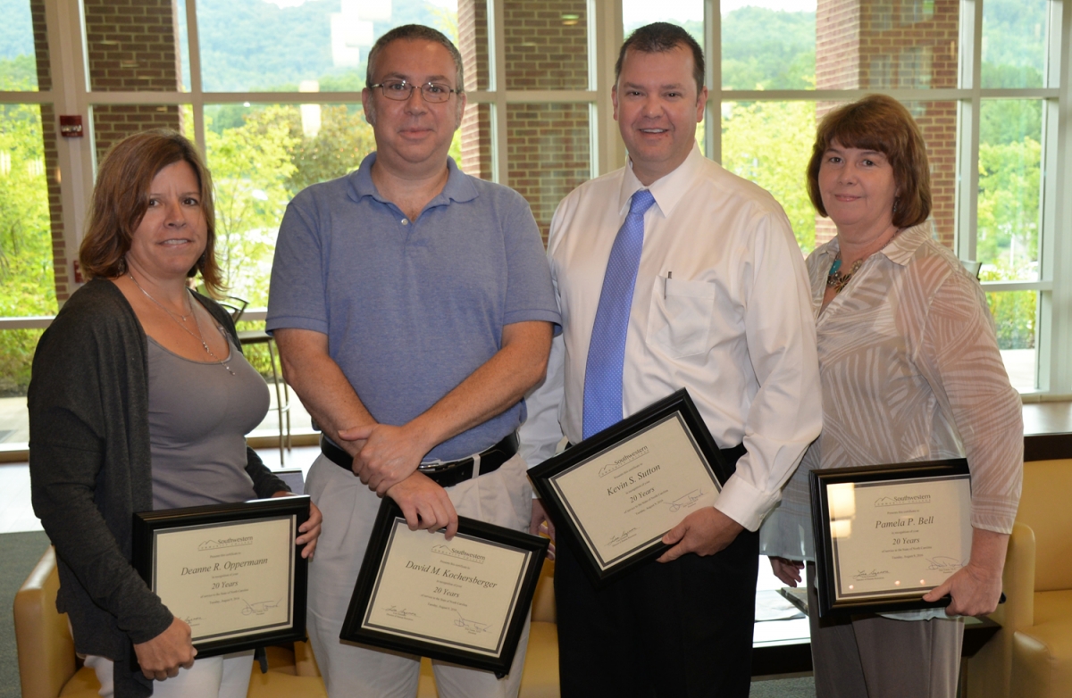 Photo of SCC employees who were honored for their years of service to North Carolina.