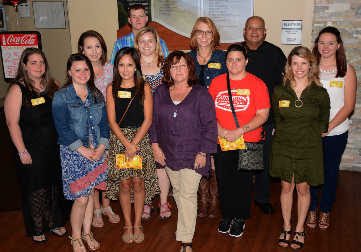 Group photo of students inside the Burrell Building