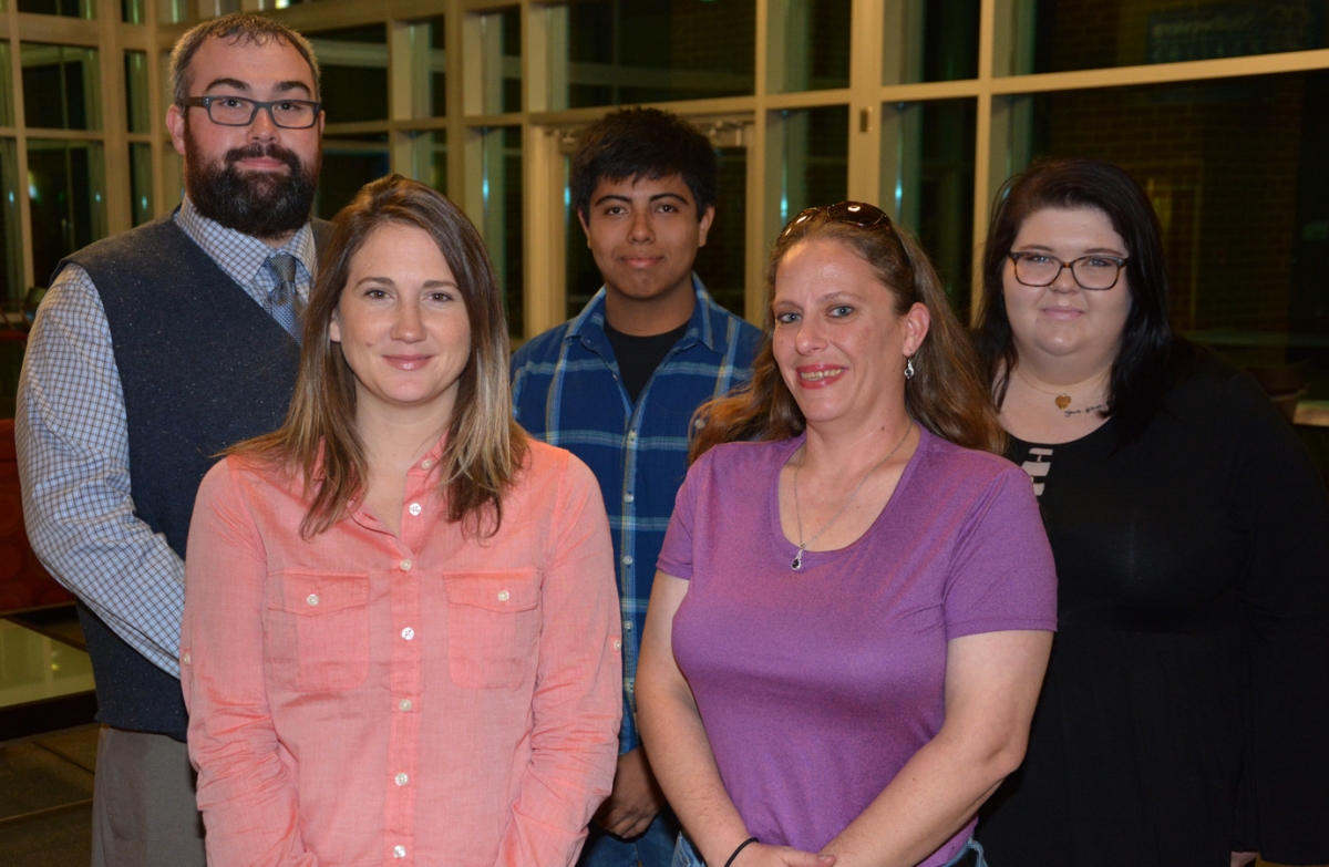 Five students pose for a photo inside a building on SCC's Jackson Campus