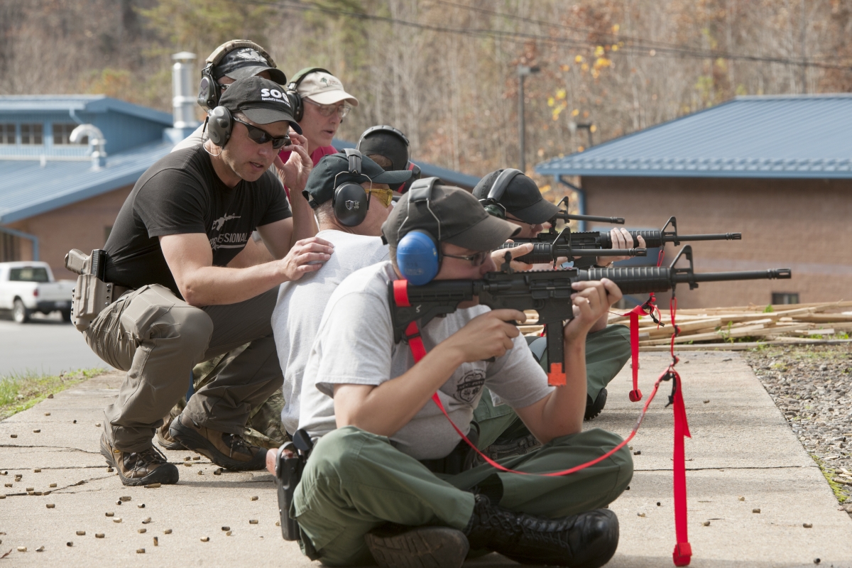 Instructor gives tips to shooter during a recent training at SCC's firing range.