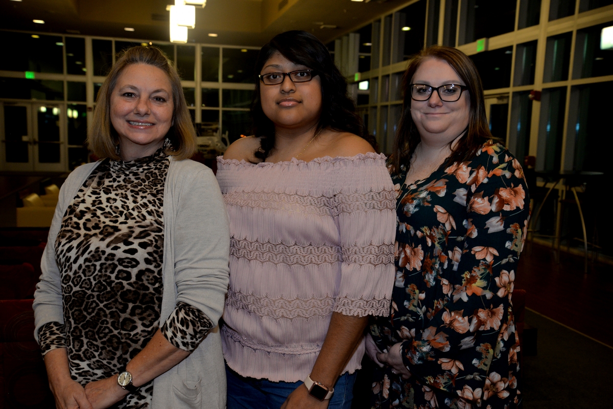 Three students stand indoors on SCC's Jackson Campus