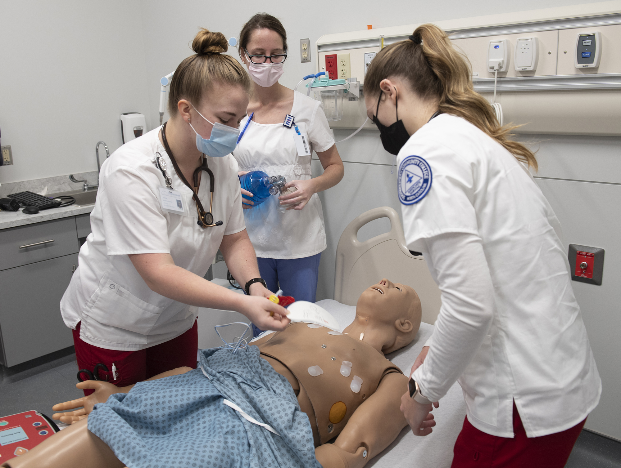 TekTone of Franklin donated the Tek-CARE® nurse-call system that’s installed in this and all of SCC’s healthcare simulation labs inside the new Health Sciences Center on Southwestern’s Jackson Campus in Sylva. Pictured here are: Nursing Instructor Jenny Payne (center), student Kennedy Sorrells of Canton (right) and Angelina McCall of Franklin.