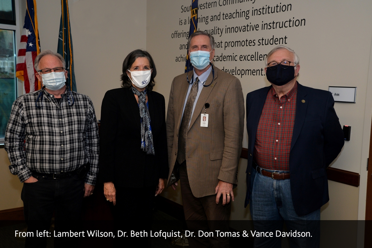 Dr. Beth Lofquist, new SCC Trustee, stands beside Lambert Wilson, Dr. Don Tomas and Vance Davidson.