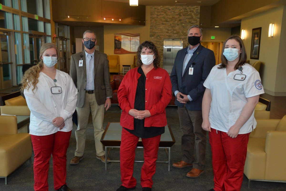 Representatives of the 2021 SCC Nursing cohort who recently established an annual scholarship are Lyndsey Starnes (left) of Granite Falls and class president Heather Wilkes of Sylva. They are pictured with, from left: Brett Woods, Director of the SCC Foundation, Michelle Evans, SCC Nursing Instructor, and Dr. Don Tomas, SCC President.