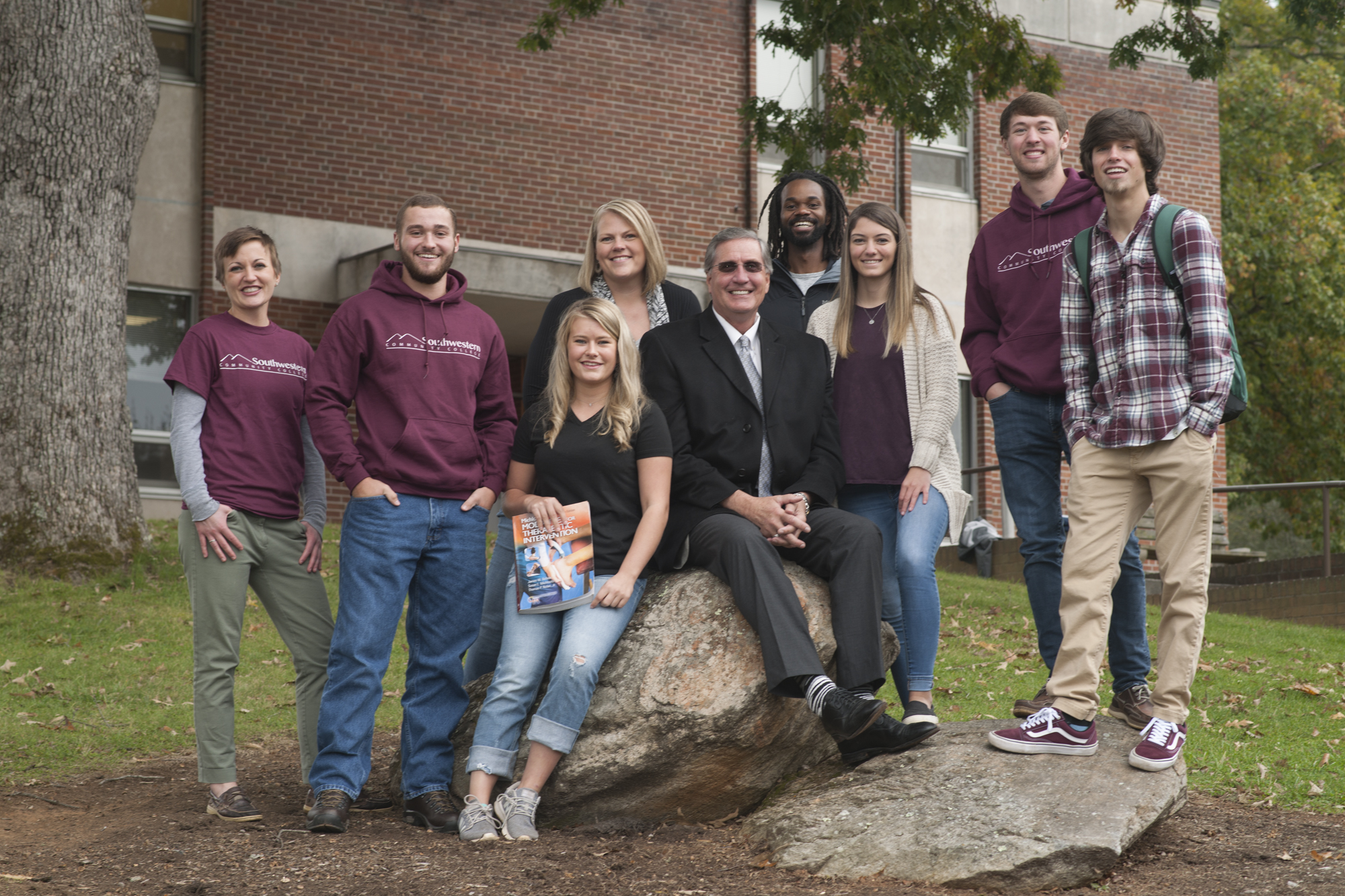 In this photo from 2018, Dr. Don Tomas is surrounded by SCC students