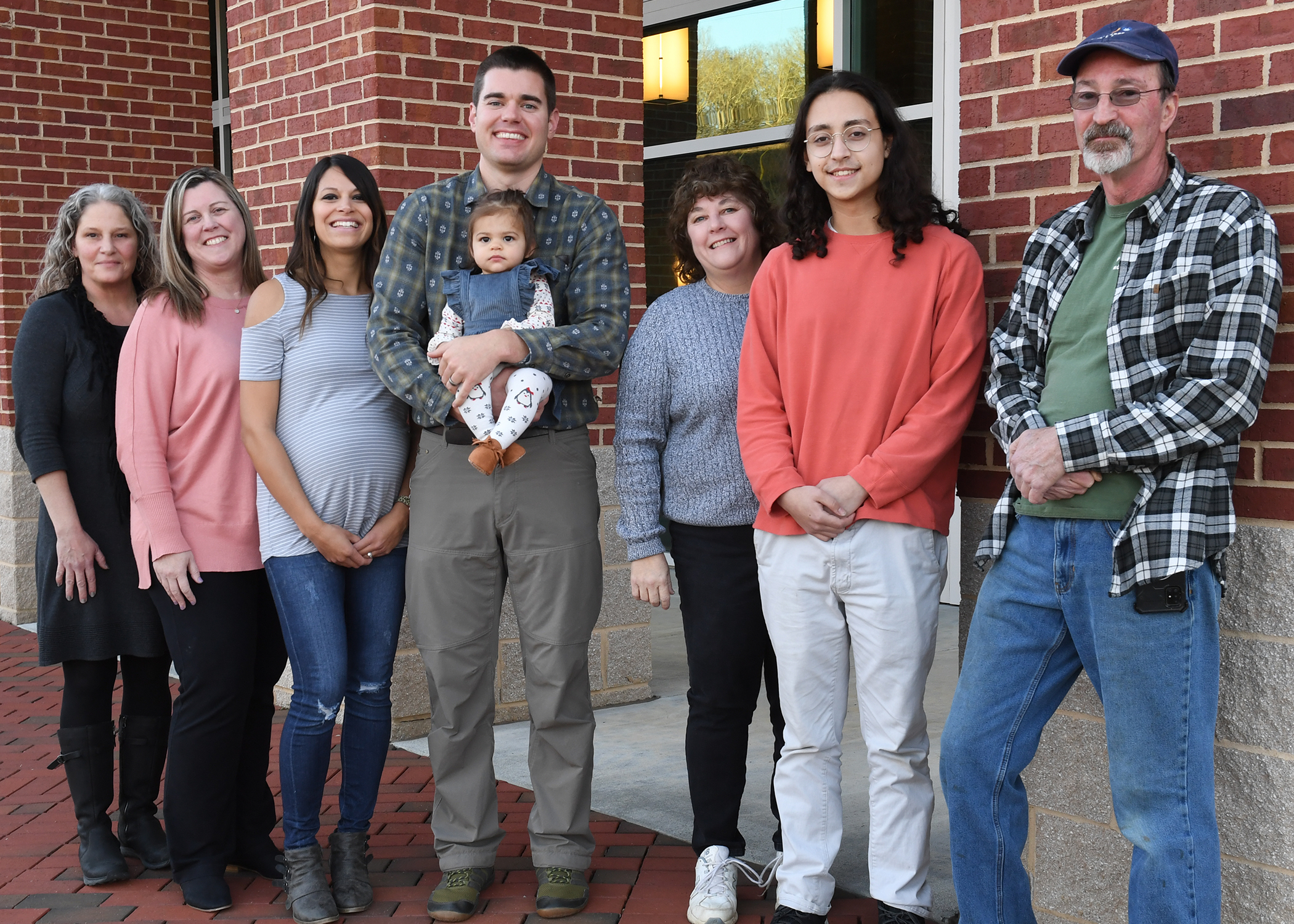 Group of individuals stand outside Burrell Building on SCC's Jackson Campus
