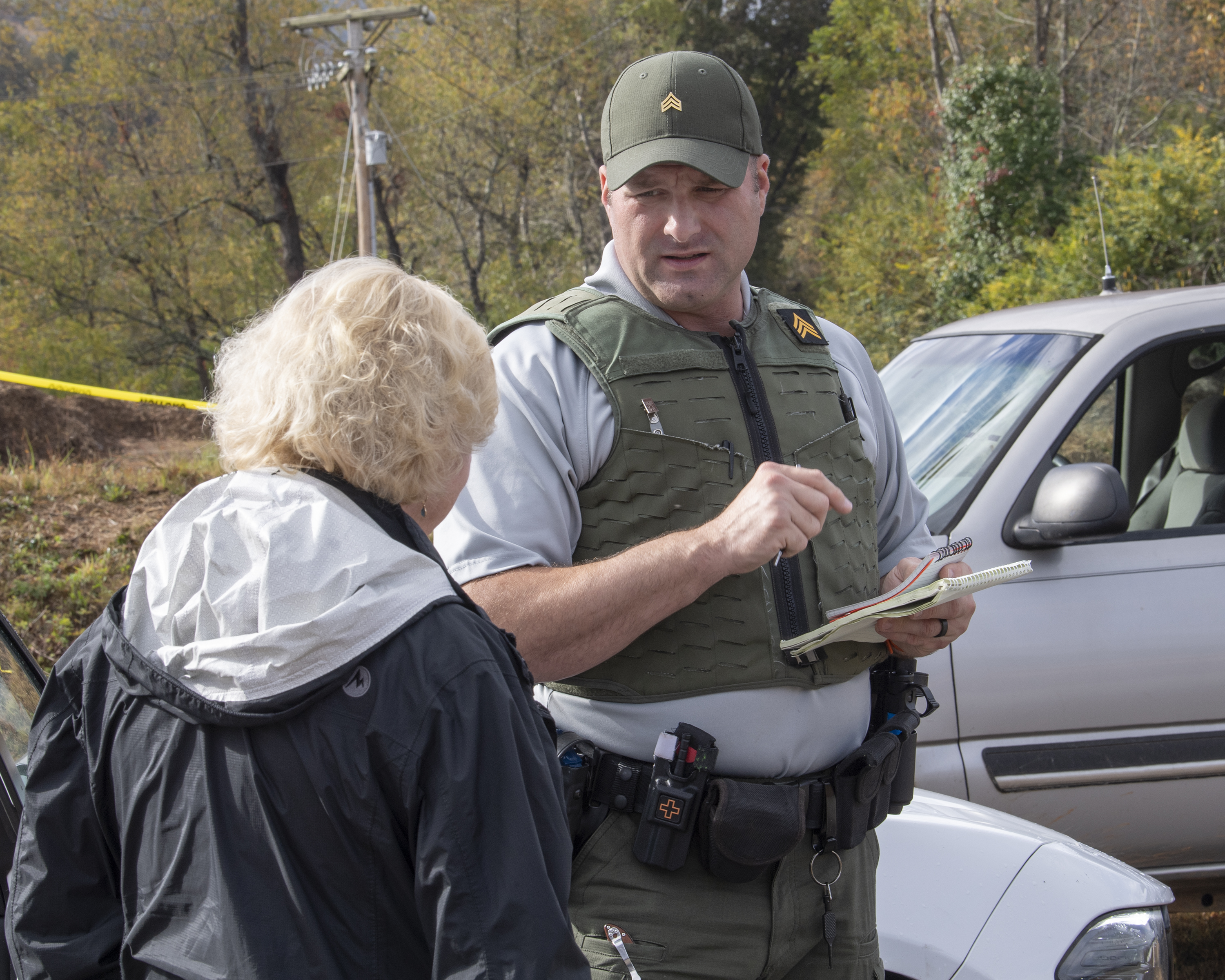 Arin Canon talks to a role player during a simulated crime scene investigation at SCC-PSTC