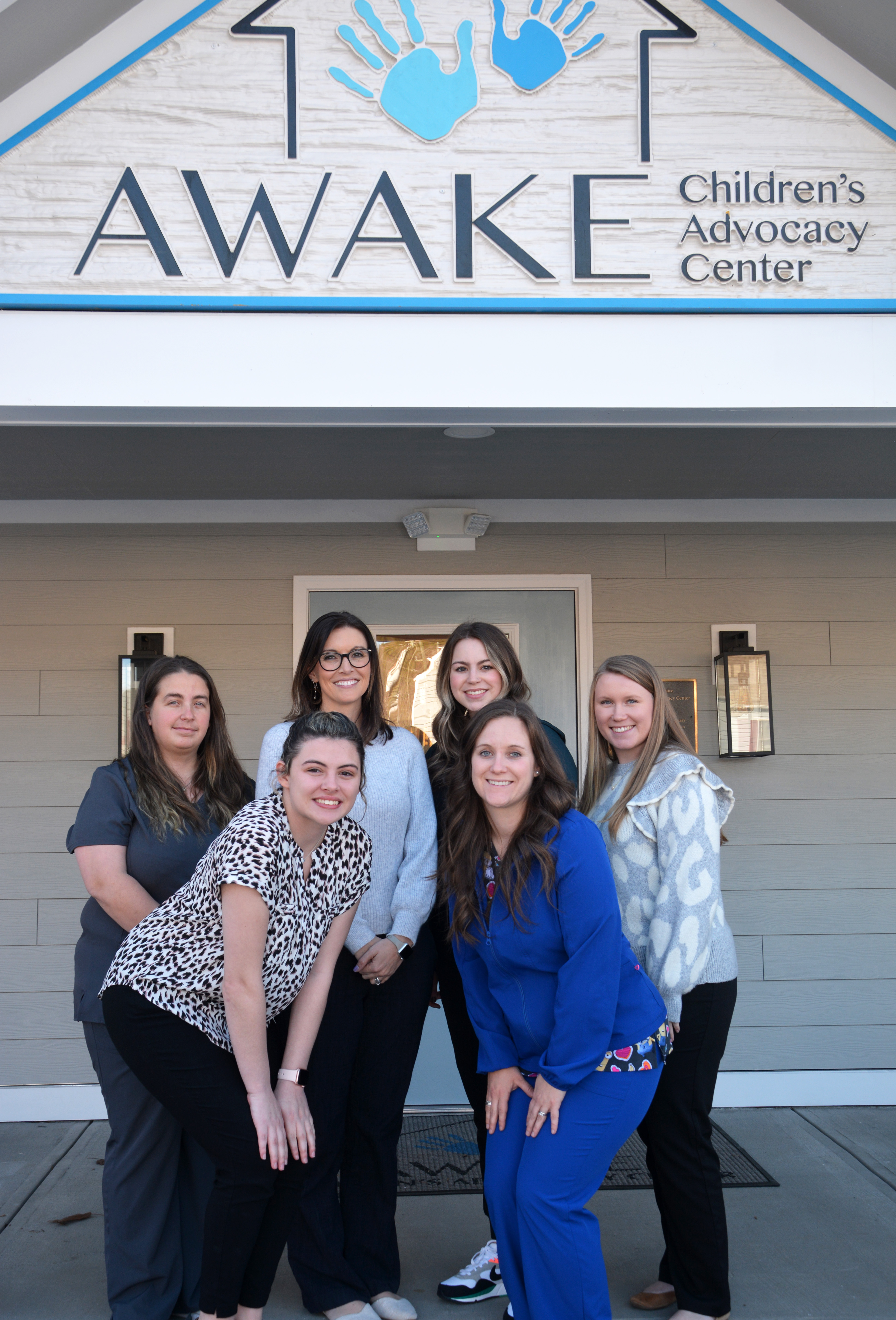 SCC Human Services Technology graduate Ashley Cook (back row, left) and second-year SCC Nursing student Elizabeth Cartwright (front left) are both employed by AWAKE Children’s Advocacy Center in Sylva. Also pictured are AWAKE employees, from left behind Cartwright: Crystal Jones, Executive Director; Maggie Grey, Forensic Interviewer/Case Manager; Paige Gilliland, Senior Forensic Interviewer; and Kristen Brady, Administrative Assistant.