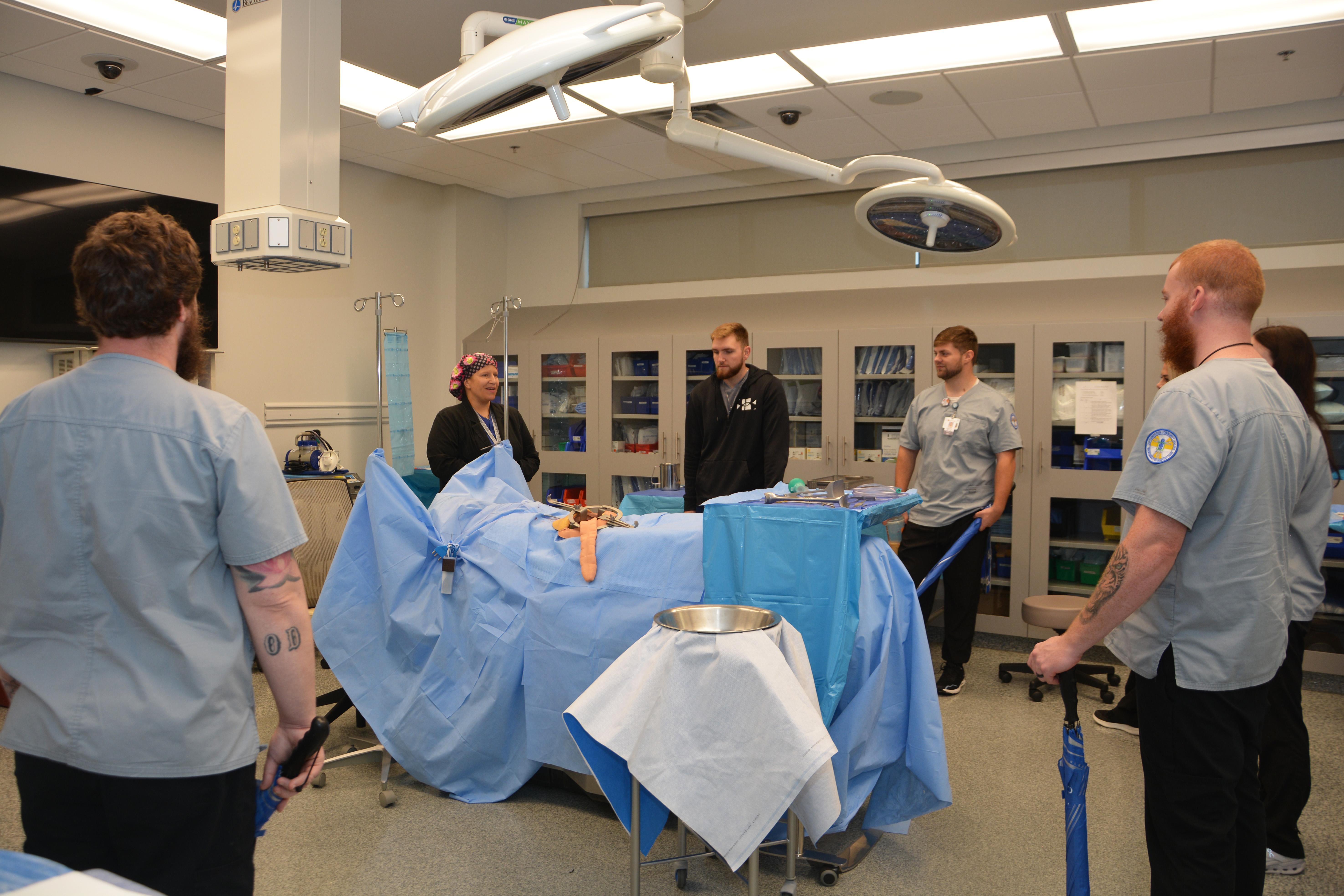 Visitors tour the Surgical Tech lab in SCC's Don Tomas Health Sciences Center