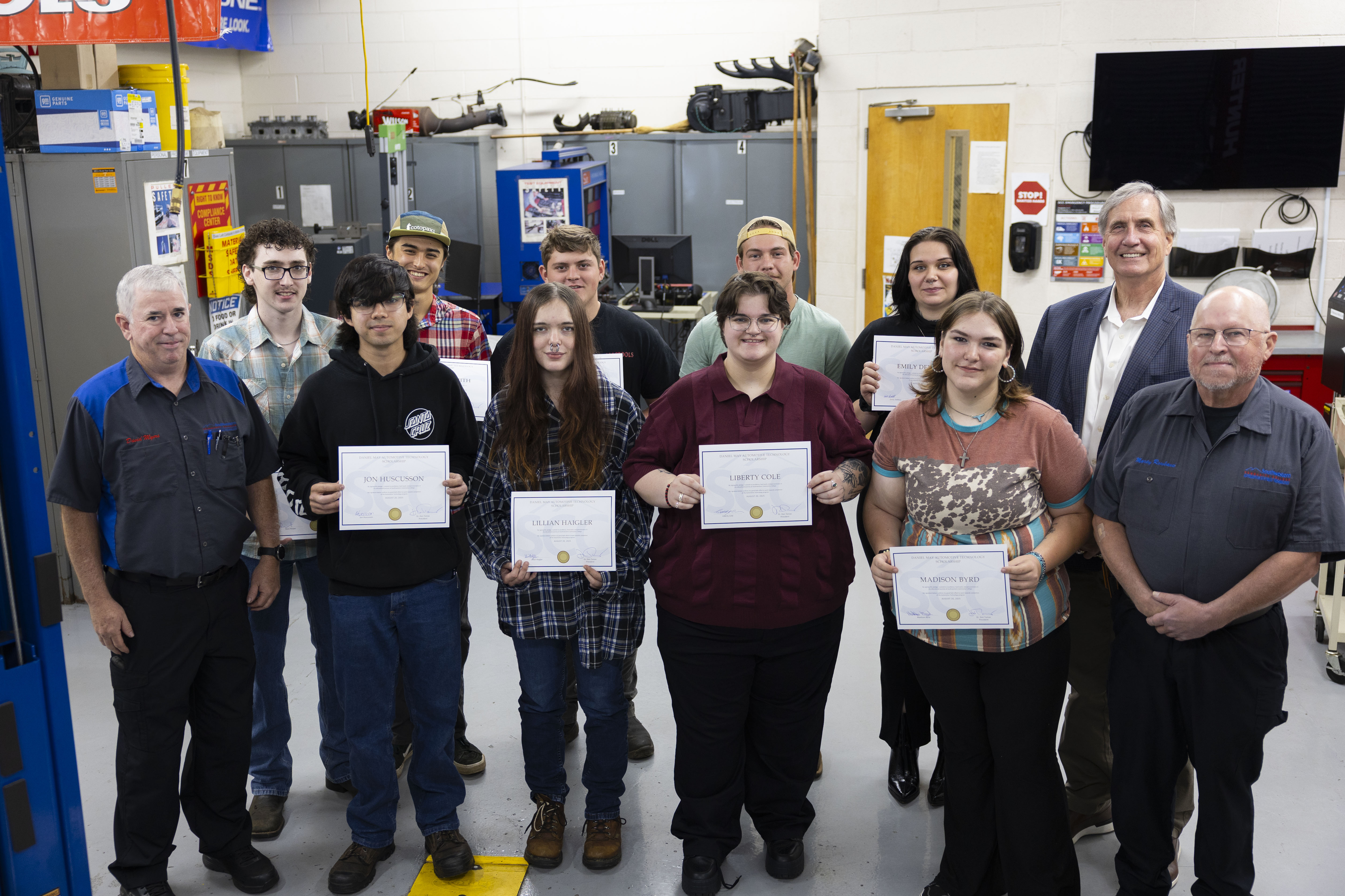 Scholarship recipients and their instructors are shown with SCC's President, Dr. Don Tomas