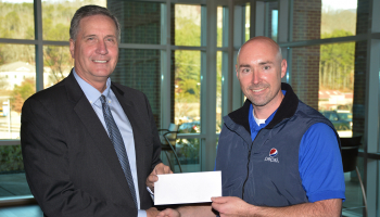 man gives man a check