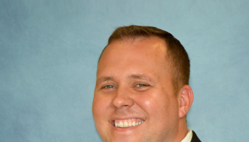 Man smiles for picture at SCC