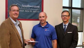 Photo of Dr. Don Tomas, Travis Ashe and Brett Woods