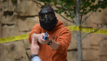 Guy holding gun for law enforcement training