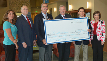 Photo of SCC receiving TRIO grant check