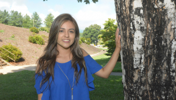 Woman stands outdoors on SCC's Jackson Campus