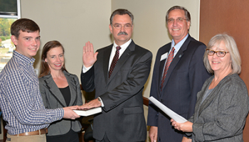 Photo of Logan, Janet and Karl Gillespie, Dr. Tomas and Ann Melton