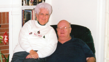 Woman and man sit together