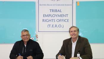 Michell Hicks (left), Principal Chief of the Eastern Band of Cherokee Indians, and Dr. Don Tomas, President of SCC, sign a Memorandum of Understanding on March 18 in Cherokee.