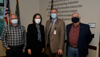 Dr. Beth Lofquist, new SCC Trustee, stands beside Lambert Wilson, Dr. Don Tomas and Vance Davidson.