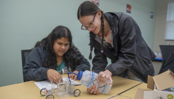 Experanza Rangel (left) and Chlor Tarter work together on the “Fuel Cell Hydrogen Car” challenge during the sixth annual Science, Technology, Engineering and Math (STEM) event on April 14 at SCC’s Macon Campus in Franklin.