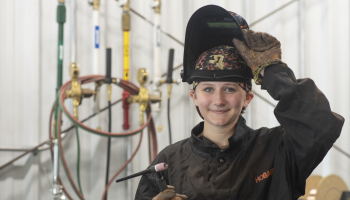 female with welding mask