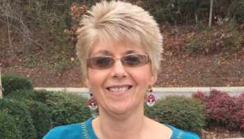 Woman smiles for picture