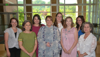 A group of students, flanked by their instructors, are shown here in a photograph taken inside the Burrell Building on SCC's Jackson Campus.