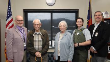 Holly Bates (fourth from left) of Franklin is the first recipient of “The George Moses Family Scholarship,” which will be awarded annually to a recruit in the Basic Law Enforcement Training program at Southwestern Community College’s Public Safety Training Center. Pictured with Bates are, from left: Curtis Dowdle, SCC’s Dean of Public Safety Training; George Moses, retired Macon County Sheriff; Margaret Moses; and Dr. Don Tomas, SCC’s President.