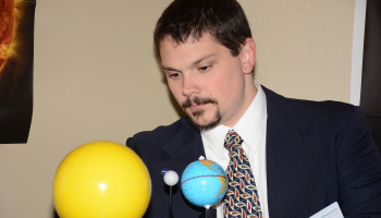 Matt Cass demonstrates how a solar eclipse works