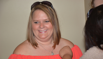 Photo of medical assisting student receiving her pin.