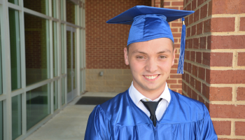 Graduate in cap and gown