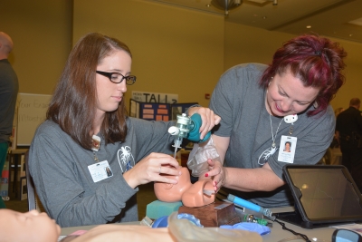 SCC respiratory student and instructor at recent STEMtastic Saturday event at SCC.